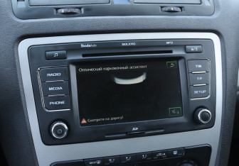 Подержанный автомобиль Skoda Octavia Liftback 2011 года (15 фото)