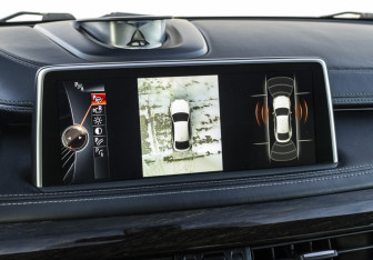 Подержанный автомобиль BMW X6 2015 года (18 фото)