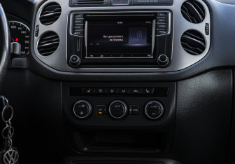 Подержанный автомобиль Volkswagen Tiguan 2016 года (13 фото)