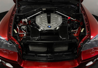 Подержанный автомобиль BMW X6 2009 года (10 фото)