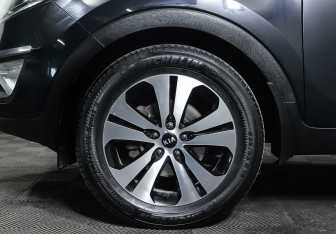 Подержанный автомобиль Kia Sportage 2012 года (9 фото)
