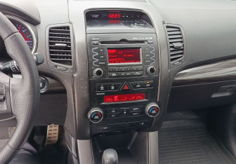Подержанный автомобиль Kia Sorento 2012 года (14 фото)