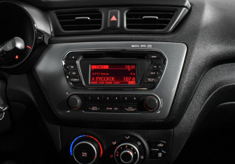 Подержанный автомобиль Kia Rio Hatchback 2014 года (13 фото)