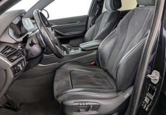 Подержанный автомобиль BMW X6 2019 года (21 фото)