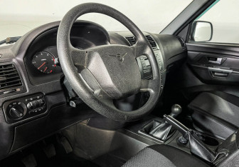 Подержанный автомобиль УАЗ Patriot 2016 года (13 фото)