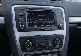 Подержанный автомобиль Skoda Octavia Wagon 2012 года (17 фото)