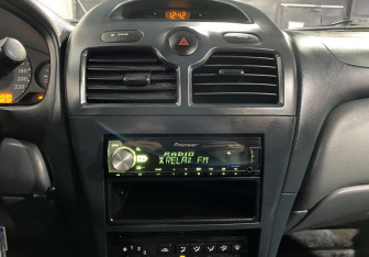 Подержанный автомобиль Nissan Almera Classic 2006 года (13 фото)