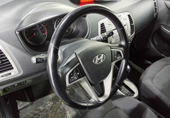Подержанный автомобиль Hyundai i20 2009 года (13 фото)