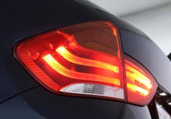 Подержанный автомобиль BMW X1 2014 года (18 фото)