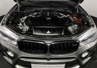 Подержанный автомобиль BMW X6 M 2015 года (10 фото)