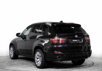 Подержанный автомобиль BMW X5 2009 года (7 фото)