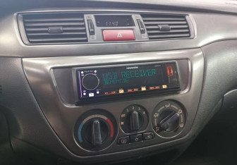 Подержанный автомобиль Mitsubishi Lancer Sedan 2007 года (13 фото)