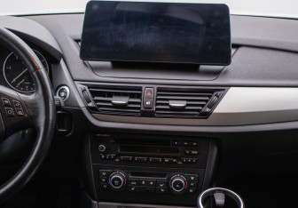 Подержанный автомобиль BMW X1 2013 года (14 фото)