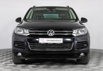 Подержанный автомобиль Volkswagen Touareg 2014 года (2 фото)