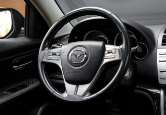 Подержанный автомобиль Mazda 6 Liftback 2008 года (13 фото)