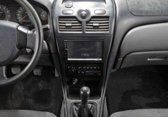 Подержанный автомобиль Nissan Almera Classic 2006 года (14 фото)