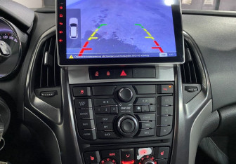 Подержанный автомобиль Opel Astra Hatchback 2011 года (13 фото)