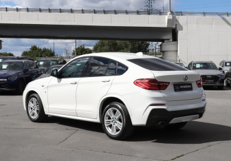 Подержанный автомобиль BMW X4 2015 года (7 фото)