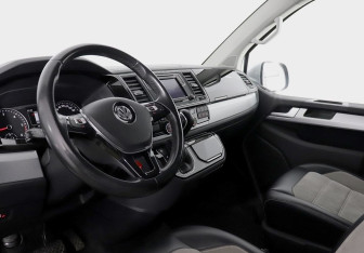 Подержанный автомобиль Volkswagen Multivan 2016 года (8 фото)