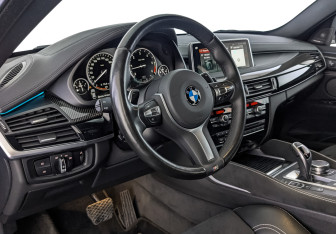 Подержанный автомобиль BMW X6 2018 года (15 фото)