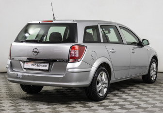 Подержанный автомобиль Opel Astra Wagon 2014 года (5 фото)