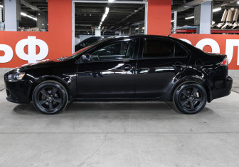Подержанный автомобиль Mitsubishi Lancer Sedan 2012 года (8 фото)