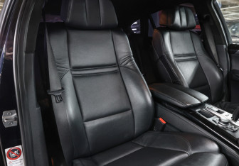 Подержанный автомобиль BMW X6 M 2013 года (12 фото)