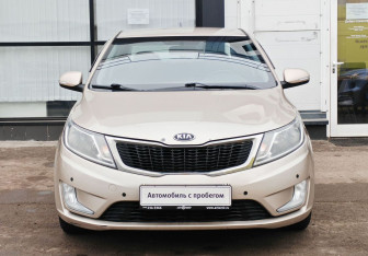 Подержанный автомобиль Kia Rio Sedan 2014 года (2 фото)