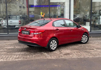 Подержанный автомобиль Kia Rio Sedan 2015 года (8 фото)