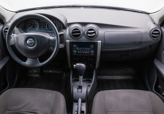 Подержанный автомобиль Nissan Almera Sedan 2013 года (13 фото)