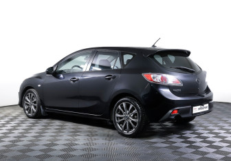 Подержанный автомобиль Mazda 3 Hatchback 2009 года (7 фото)