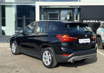 Подержанный автомобиль BMW X1 2016 года (7 фото)