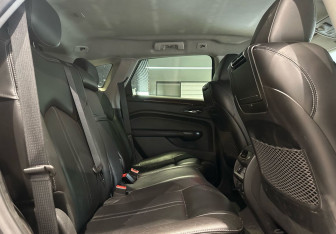 Подержанный автомобиль Cadillac SRX 2013 года (11 фото)