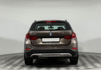 Подержанный автомобиль BMW X1 2014 года (4 фото)