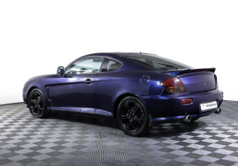 Подержанный автомобиль Hyundai Coupe 2002 года (7 фото)