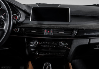 Подержанный автомобиль BMW X6 2015 года (3 фото)