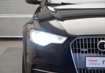 Подержанный автомобиль Audi A6 allroad 2014 года (38 фото)