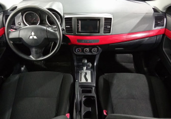 Подержанный автомобиль Mitsubishi Lancer Sedan 2014 года (9 фото)