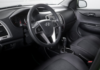 Подержанный автомобиль Hyundai i20 2009 года (14 фото)