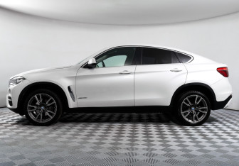 Подержанный автомобиль BMW X6 2016 года (8 фото)