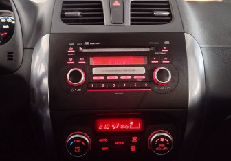 Подержанный автомобиль Suzuki SX4 Hatchback 2010 года (14 фото)