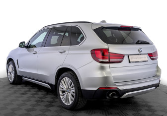 Подержанный автомобиль BMW X5 2015 года (7 фото)