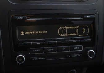 Подержанный автомобиль Volkswagen Touran 2011 года (16 фото)