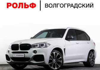 Подержанный автомобиль BMW X5 2014 года (25 фото)