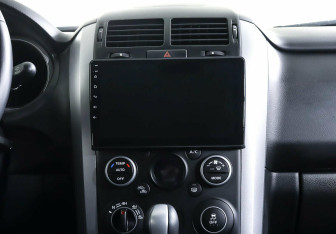 Подержанный автомобиль Suzuki Grand Vitara 2014 года (13 фото)