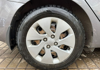 Подержанный автомобиль Kia Rio Sedan 2014 года (13 фото)