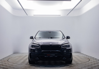 Подержанный автомобиль BMW X6 2014 года (8 фото)