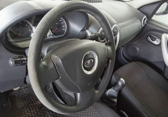 Подержанный автомобиль LADA (ВАЗ) Largus Wagon 2012 года (13 фото)