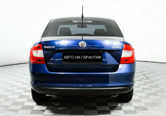 Подержанный автомобиль Skoda Rapid Liftback 2014 года (4 фото)