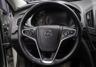 Подержанный автомобиль Opel Insignia Wagon 2014 года (17 фото)